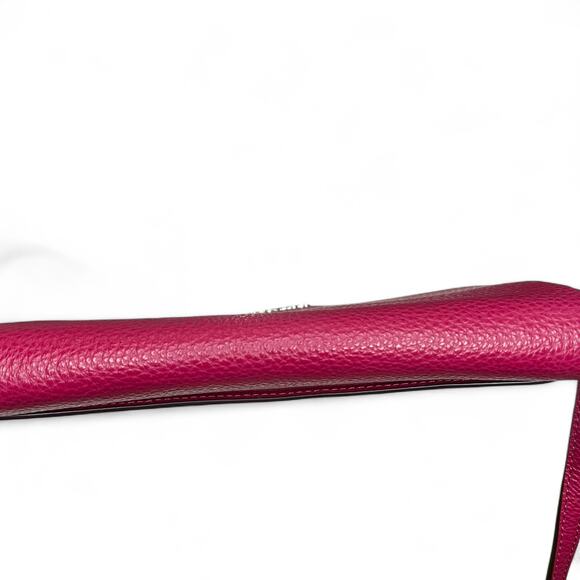Coach Foldover Crossbody Clutch in the color Dark Fuchsia leather w/ charm NWT - Picture 3 of 13